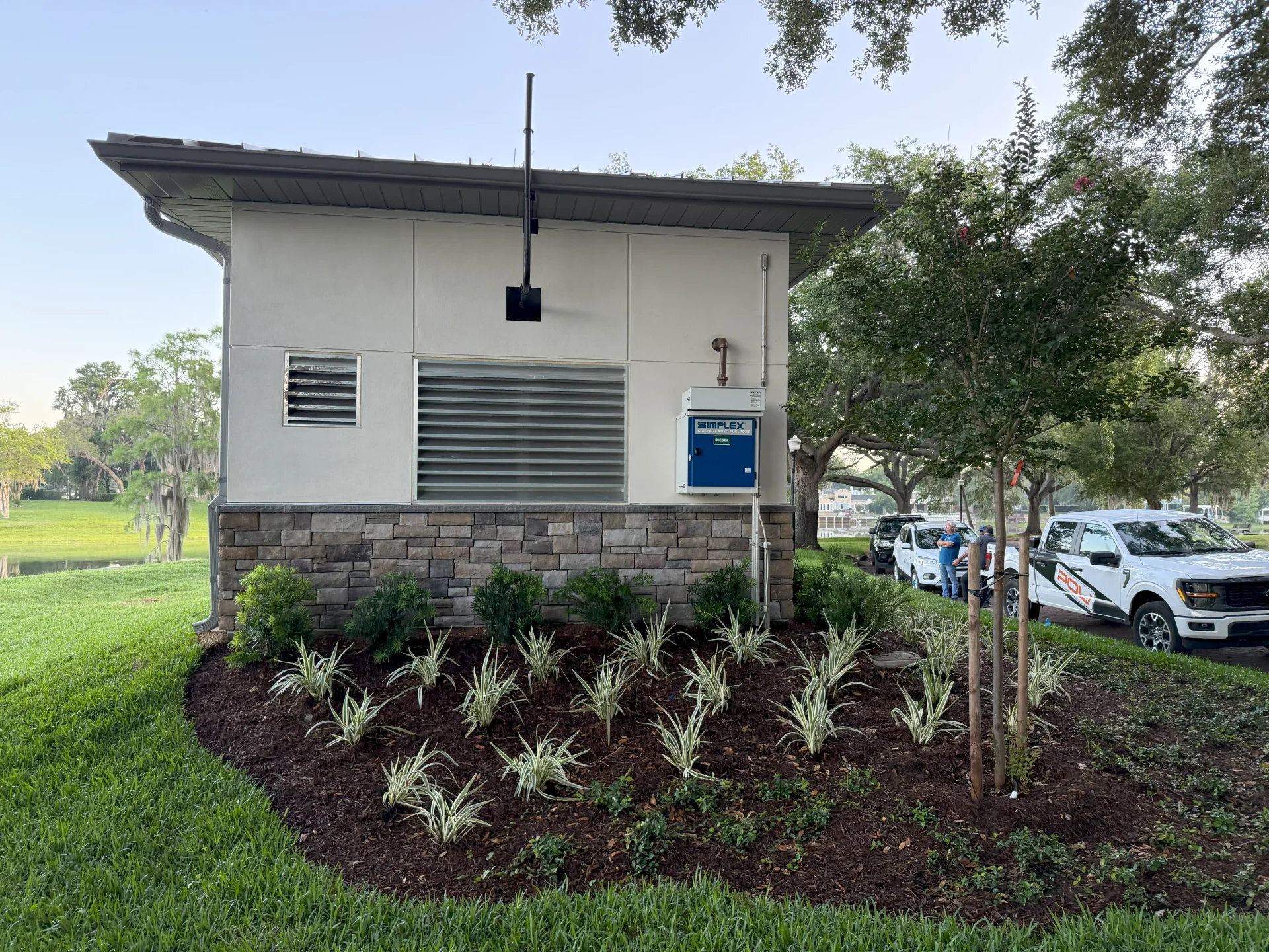 outdoor housing unit with lawn